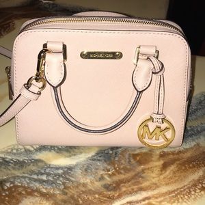 Gently used pink Michael Kors crossbody